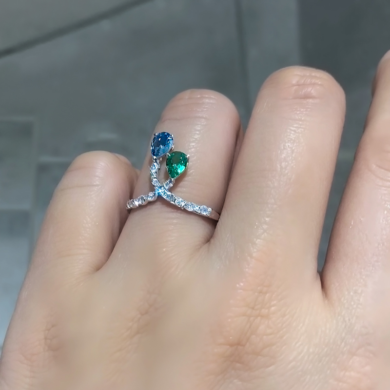 Elegant Dual Gemstone Ring with Sparkling Accents Elegant Dual Gemstone Ring with Sparkling Accents