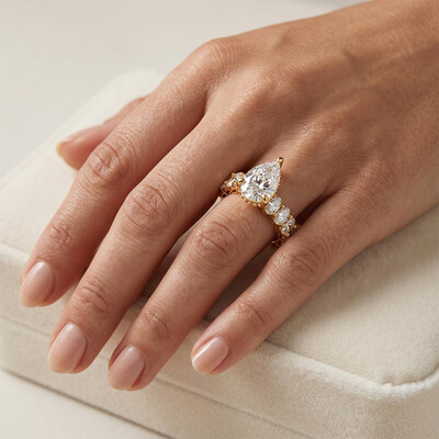 7.71ct. tw. Pear Cut VVS Moissanite Pave Engagement Ring