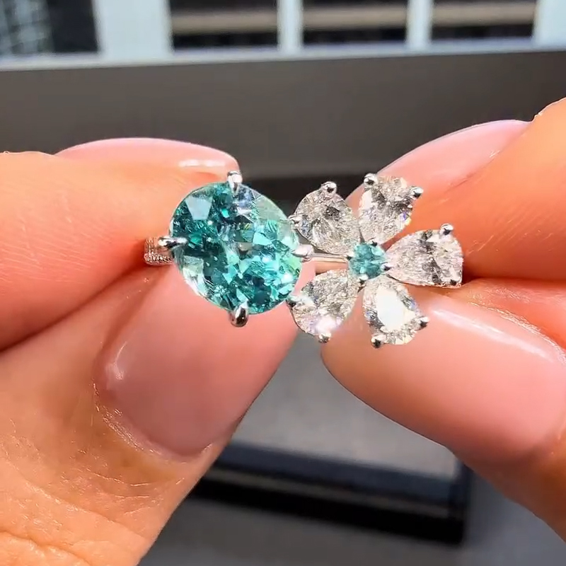 Teal Blue Oval Gemstone with Floral Diamond Accents Engagement Ring Teal Blue Oval Gemstone with Floral Diamond Accents Engagement Ring