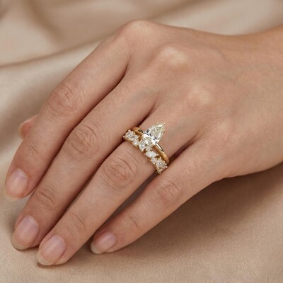 2.74ct. tw. Pear Cut VVS Moissanite Pave Engagement Ring Set
