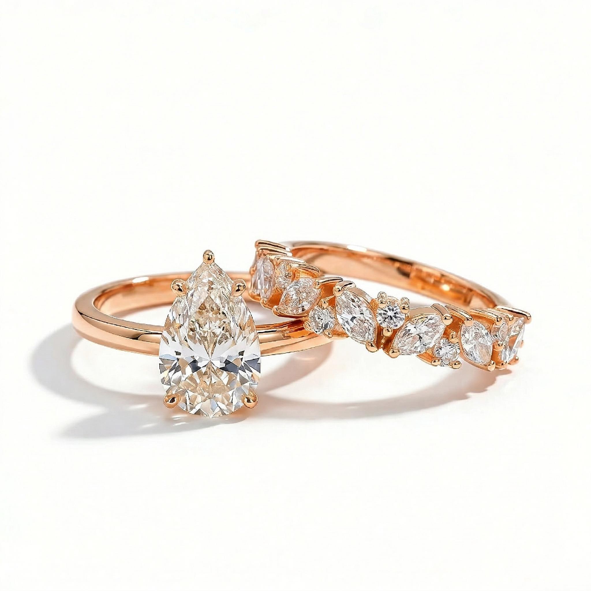 2.74ct. tw. Pear Cut VVS Moissanite Pave Engagement Ring Set