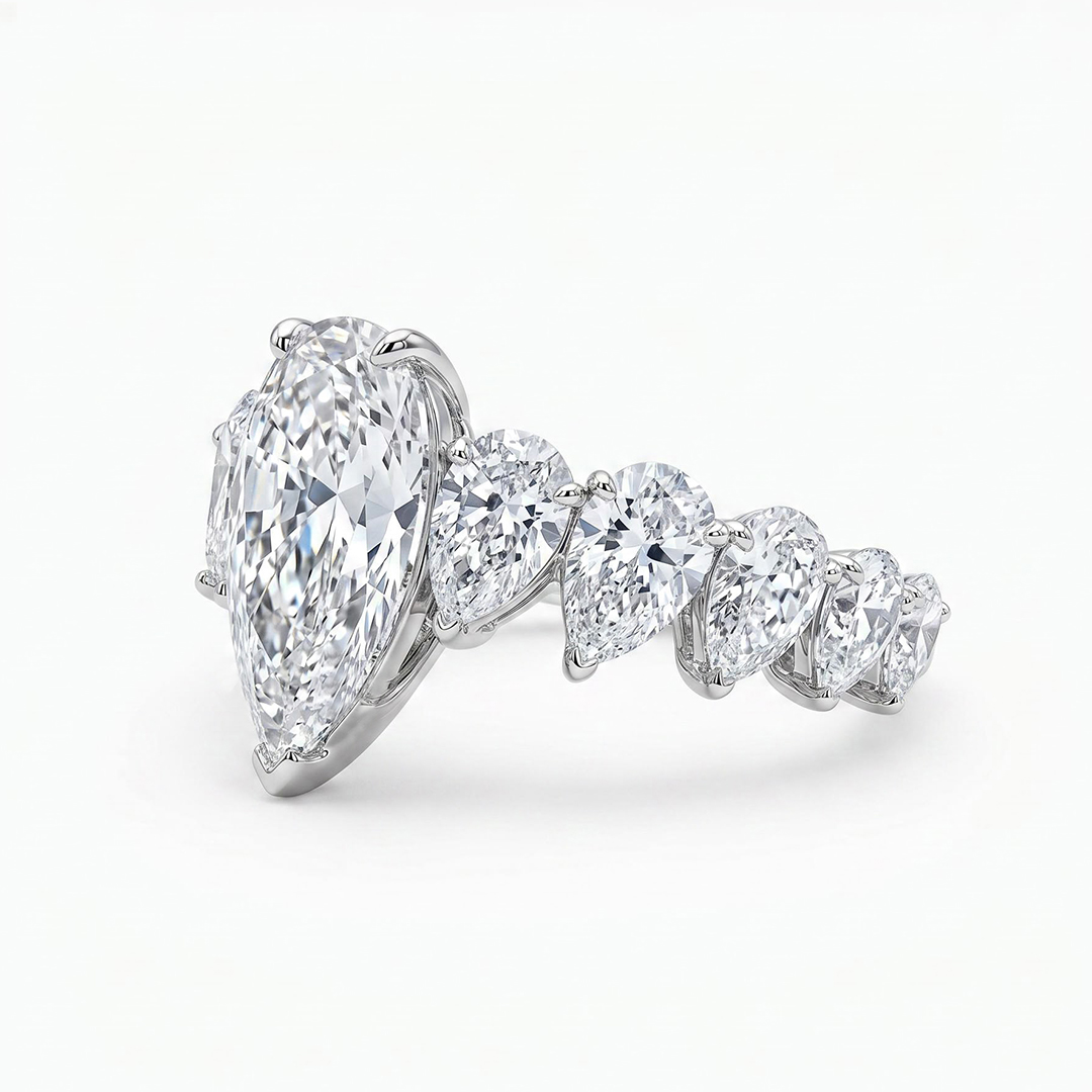 5.57ct. tw. Pear Cut VVS Moissanite Pave Engagement Ring