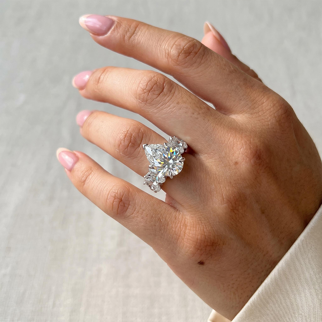 5.57ct. tw. Pear Cut VVS Moissanite Pave Engagement Ring