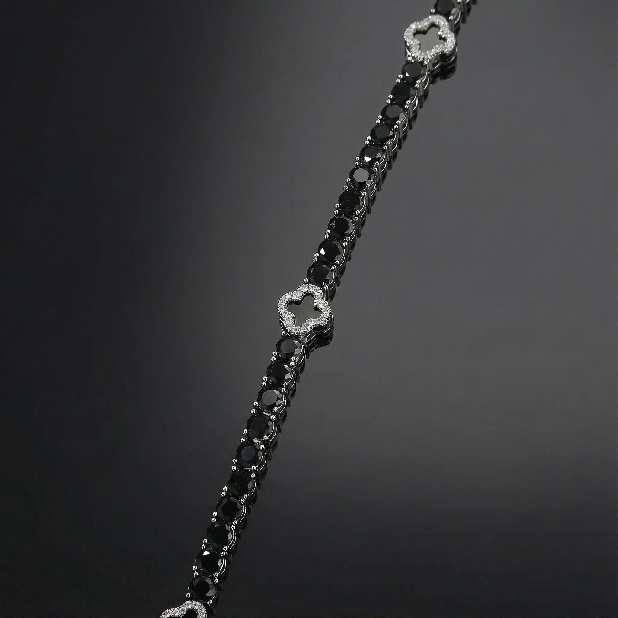Iced Out Black Four Leaf Clover Tennis Bracelet in White Gold
