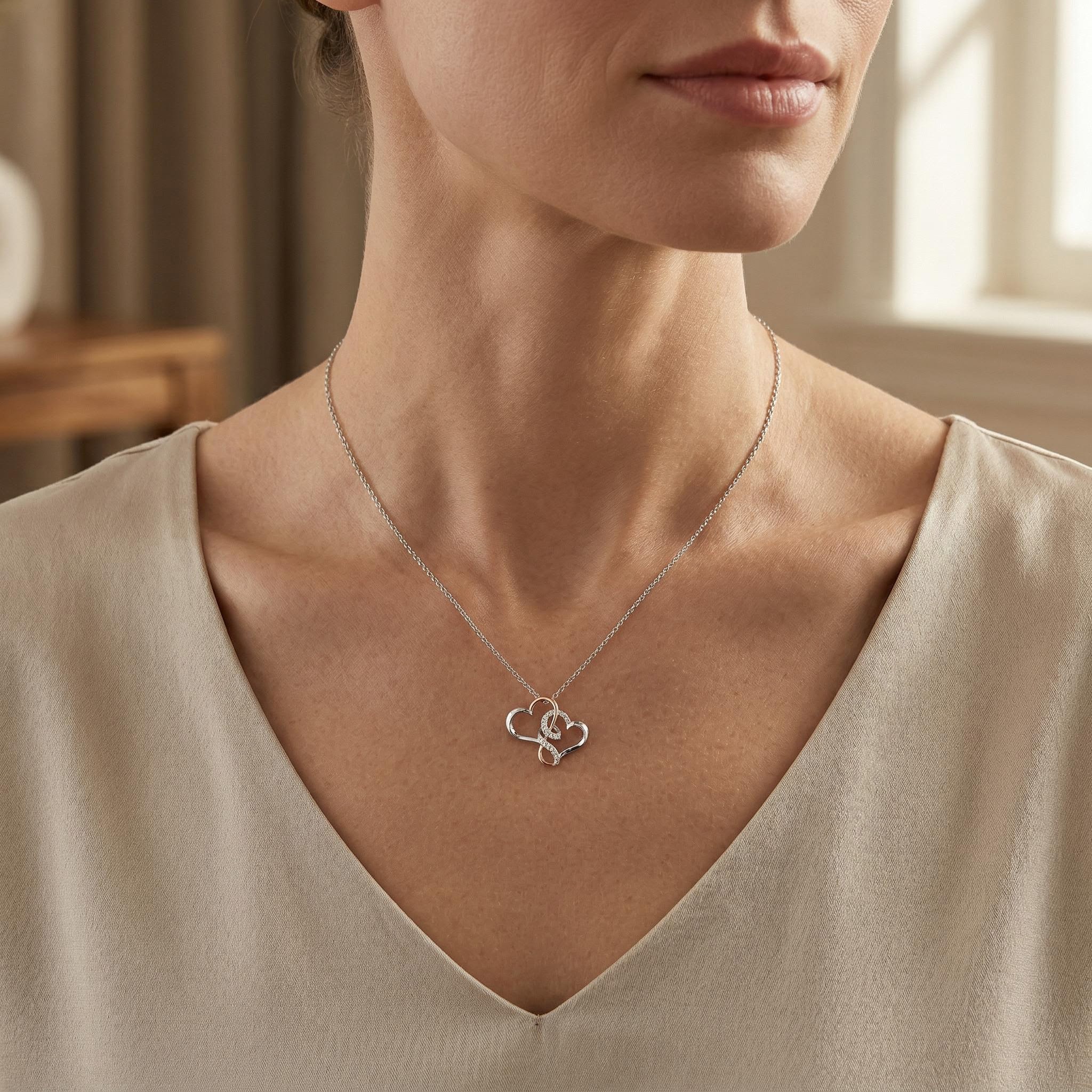 0.5 ct.tw. Two-tone Intertwined Hearts VVS Moissanite S925 Silver Pendant