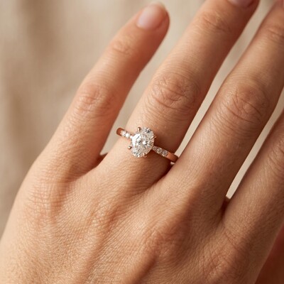 1.18 ct.tw. Graduated Side Oval Cut Hidden Halo Engagement Ring