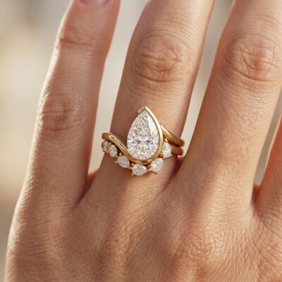 2.5 ct.tw. Twisted Band Pear Cut Side Stone Engagement Ring