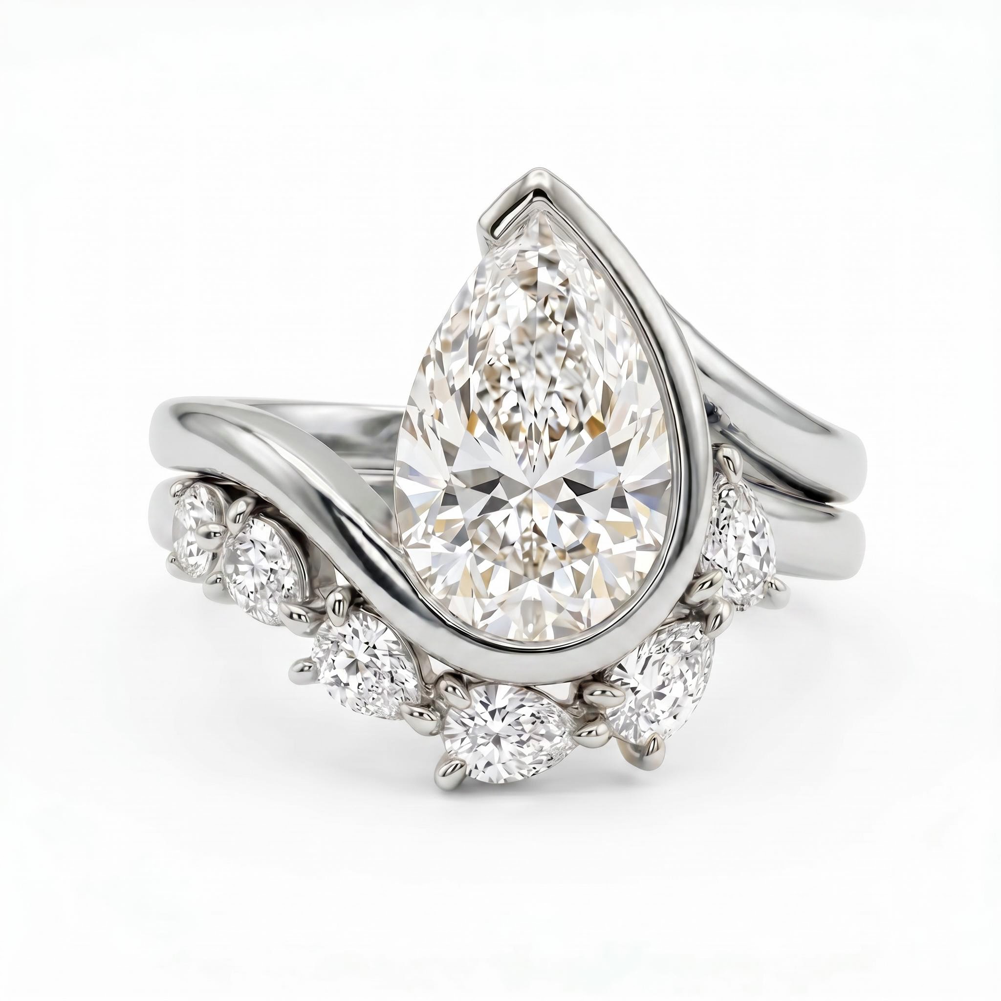 2.5 ct.tw. Twisted Band Pear Cut Side Stone Engagement Ring