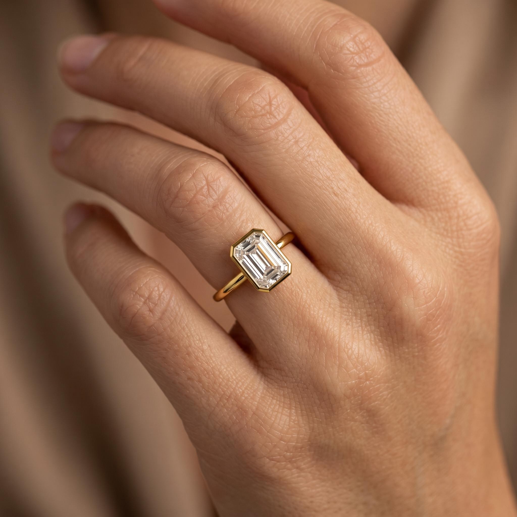 2.0 ct.tw. Bezel Emerald Cut Lab Grown Diamond Engagement Ring