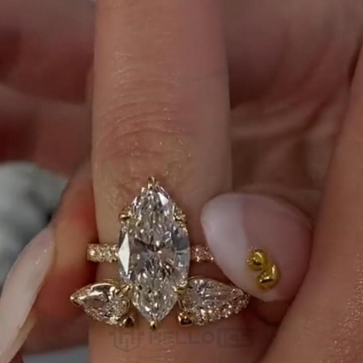 3.71 ct.tw. Marquise Cut Hidden Halo Three-Stone 2-Piece Sparkling Bridal Set 3.71 ct.tw. Marquise Cut Hidden Halo Three-Stone 2-Piece Sparkling Bridal Set