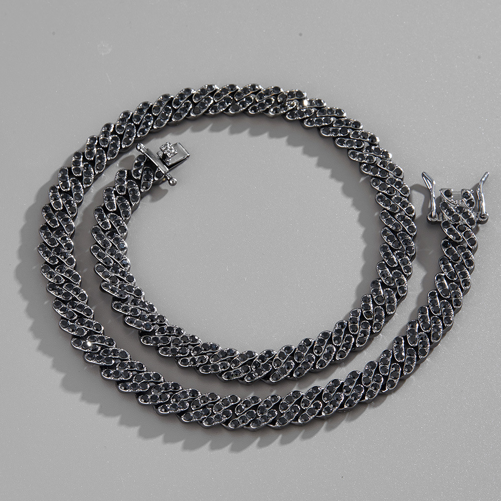 Iced 9mm Black/Emerald/Purple Cuban Link Chain in Black Gold Iced 9mm Black/Emerald/Purple Cuban Link Chain in Black Gold