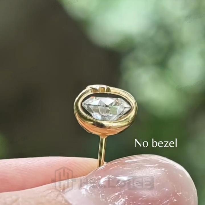 1.0 ct.tw. Star Accent Round Cut Bezel Set Stud Earrings 1.0 ct.tw. Star Accent Round Cut Bezel Set Stud Earrings