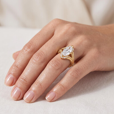 5.29 ct.tw. Vintage carved marquise-cut halo ring